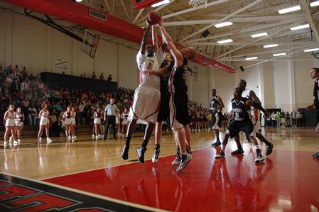 Senior Greg Truvillion goes up for a shot during a TranSouth Tournament championship game against Freed Hardeman University. The Bulldogs won 75-65. - Photo by Jordan Buie