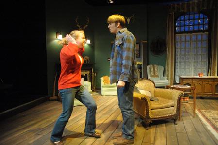 Jillian Barron, freshman theatre/speech major, and David Conway, sophomore history major, perform as Molly and Cliff Ralston in the Union University Players production of The Mousetrap. - Photo by Morris Abernathy