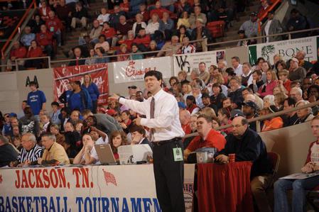 Mark Campbell, head coach of the Lady Bulldogs basketball team, communicates with the players during the Semifinals of the NAIA National Tournament against Oklahoma City University.  - Photo by Morris Abernathy