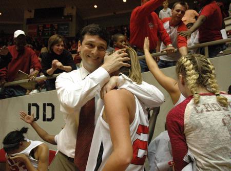 Head coach Mark Campbell shares a moment with Kayla Hudson, junior, after the Lady Bulldogs became NAIA Division I National Champions for the second year in a row.  - Photo by Jordan Buie
