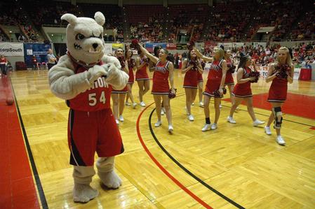 Buster the Bulldog joins the cheerleaders to cheer for the Lady Bulldogs during the Championship game of the NAIA National Tournament. - Photo by Jordan Buie
