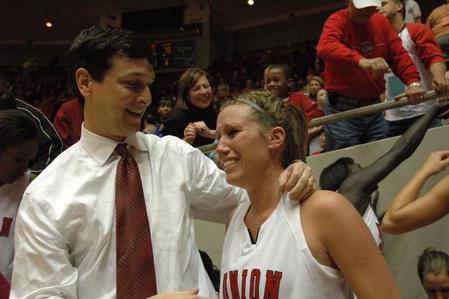 Head coach Mark Campbell talks to an emotional Kayla Hudson, junior, after the Lady Bulldogs became NAIA Division I National Champions for the second year in a row.  - Photo by Jordan Buie