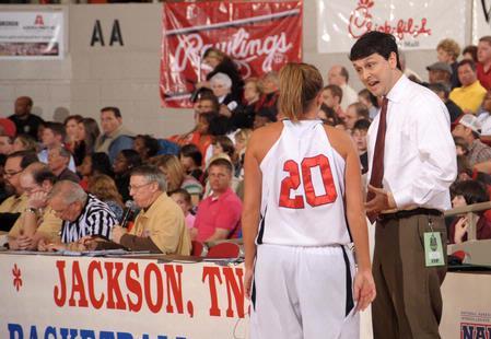 Mark Campbell, head coach, and Kayla Hudson, junior psychology major, have a quick talk on the sidelines during the Championship game of the NAIA National Tournament. The Lady Bulldogs defeated Azusa Pacific University 73-65. - Photo by Morris Abernathy