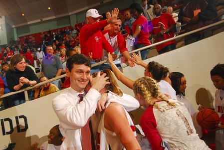 Head coach Mark Campbell shares a moment with Kayla Hudson, junior, after the Lady Bulldogs became NAIA Division I National Champions for the second year in a row.  - Photo by Morris Abernathy