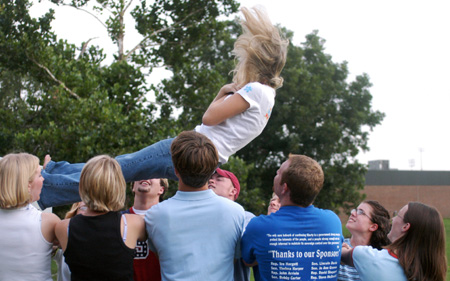 Keelan Cook's FOCUS group participates in a trust exercise during FOCUS 2003. - Photo by Kristen Nicole Sayres
