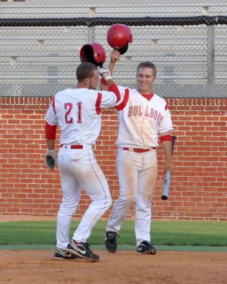 David Maristany (21) and Beau Baker celebrate after a Maristany home run. - Photo by Steven Aldridge