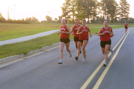 The Union women's cross country team during a run. - Photo by Jim Veneman