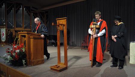 Dr. David S. Dockery, president of Union University, closes Awards Chapel in prayer after awards were presented to exemplary faculty, staff, and students.  - Photo by Morris Abernathy
