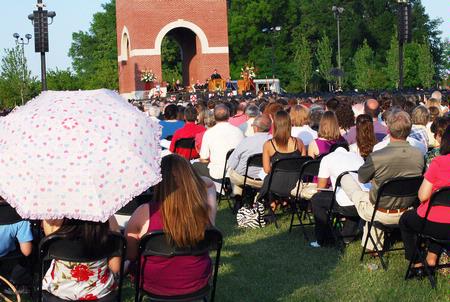 Friends and family of 2010 graduates listen as Dr. David S. Dockery introduces the speaker for the Spring commencement ceremony. - Photo by Abigail Harris