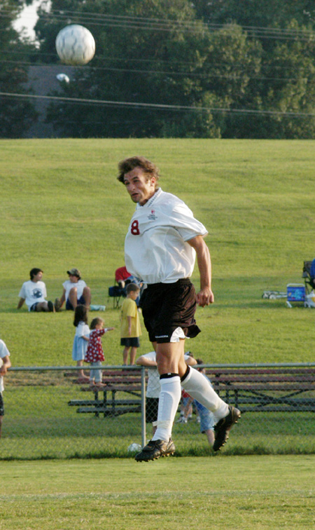 Senior Kyle McDiarmid heads a ball during a recent game against Fisk University. - Photo by Lindsay Stavish