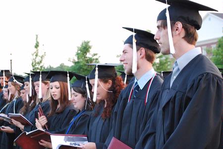 2010 graduates sing the Alma Mater at the close of the spring 2010 commencement ceremony.  - Photo by Abigail Harris