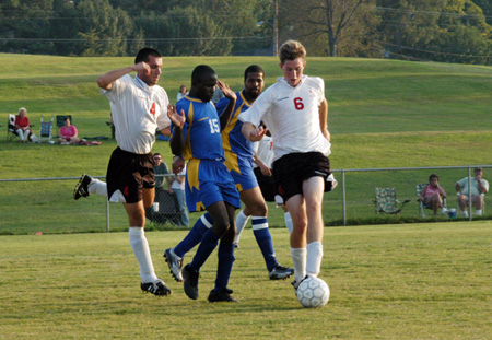 Junior Redzi Stojiljkovic and Freshman Duncan Nicol show some bulldog spirit by keeping the ball from Fisk University in the tournament last Saturday. Union defeated Fisk 16-0. - Photo by Lindsay Stavish