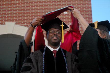 Mario R. Keys, Sr. receives his doctorate during the Spring 2010 commencement ceremony. - Photo by Beth Spain