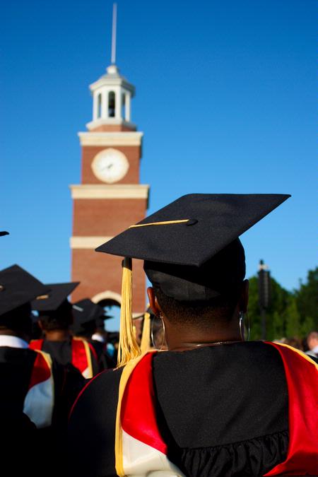 Masters students wait to receive their diplomas at the spring 2010 commencement ceremony. - Photo by Ebbie Davis