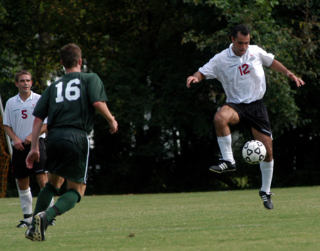 Fabio Buarque (12) shows some fancy footwork in controlling the ball.  Daniel Lee (5) looks on for Union. - Photo by Jonathan Blair