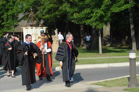Dr. David S. Dockery, president of Union University, and Thom Rainer, president of LifeWay Christian Resources, lead the processional of students and faculty to the spring 2010 commencement ceremony. - Photo by Morris Abernathy