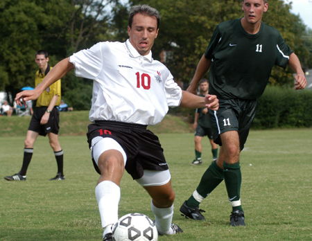 Senior Kekec Zivkovic (10) reaches for a ball during a game against Belhaven College (Miss.). - Photo by Jonathan Blair