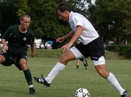 Senior Kekec Zivkovic (10) uses some fancy footwork during recent game. - Photo by Jonathan Blair