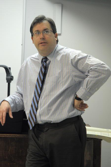 Dr. Gavin Richardson, associate professor of English, teaches a class.  - Photo by Morris Abernathy