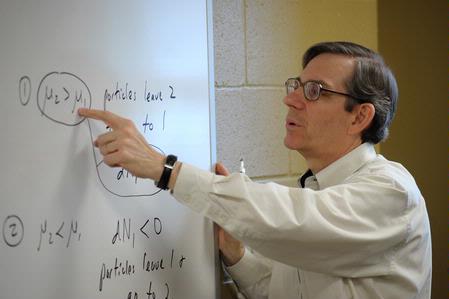 Dr. David Ward, professor of physics, teaches a class.  - Photo by Morris Abernathy