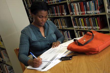 Many students chose to work at the quiet individual study tables in the Emma Waters Summar Library.  - Photo by Morris Abernathy