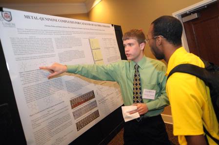 Students present their semester long projects at the annual scholarship symposium. - Photo by Morris Abernathy
