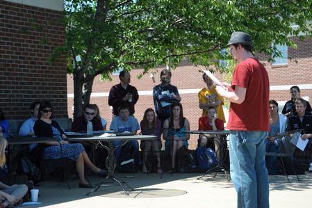 English majors presented their semester long projects outside Barefoots Joe for the annual scholarship symposium. - Photo by Morris Abernathy