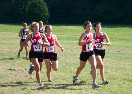 Adrienne Briles, Stacey Chandler, Janelle Royer, and Courntney Owens (L to R) are packed together in a cross country event.
 - Photo by Uncredited