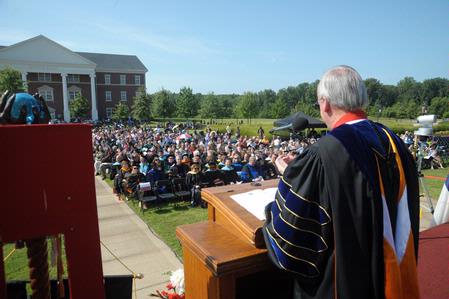 Dr. David S. Dockery greets friends and family at the 185th graduation ceremony. - Photo by Morris Abernathy
