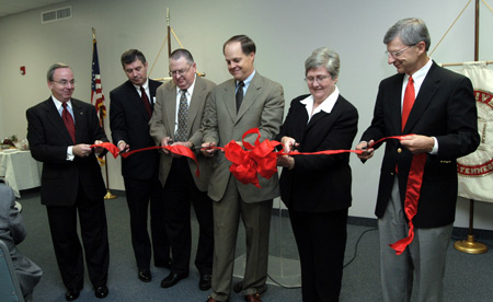 Union President David S. Dockery joins trustees and friends of the university during ribbon cutting ceremonies for the rennovations at the Germantown campus. - Photo by Jim Veneman