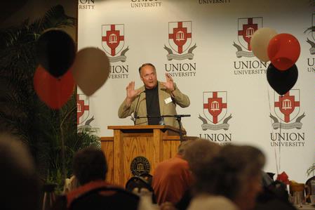 Dr. Jerry Tidwell, senior vice president for university relations, speaks to guest of the Senior Adult Extravaganza. - Photo by Morris Abernathy