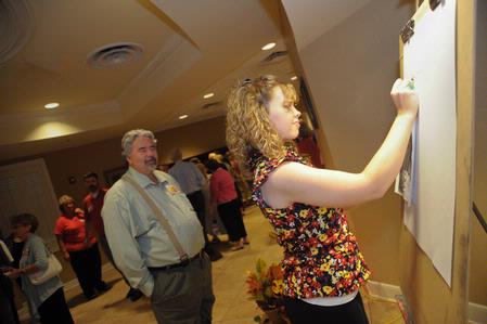 Union University held its annual Back to School Dinner for their faculty and staff on Tuesday. 

Christian artist and Union art graduate Kelsey Roberts worked on a drawing while faculty and staff arrived. - Photo by Morris Abernathy