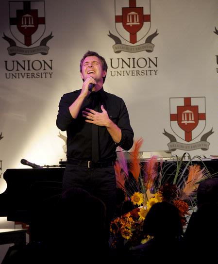 Travis Cottrell, Christian artist and worship leader for Englewood Baptist Church, provides the entertainment at the Faculty/Staff dinner.  - Photo by Morris Abernathy