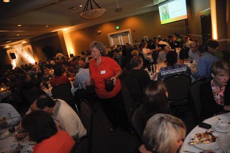 Anna Clifford, associate professor of early childhood education, helps out at the Faculty/Staff dinner. She served on the committee to plan this wonderful event. - Photo by Morris Abernathy