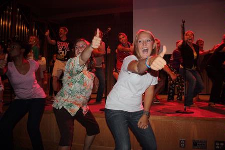 Focus Leaders Rebecca Eaton and Kendal Conner show excitement with their fellow leaders at the Fall 2010 Focus Show. - Photo by Ebbie Davis