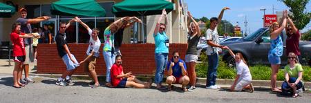 While on the Focus Scavenger Hunt, Freshman complete a task by spelling FOCUS with their bodies.  - Photo by Ebbie Davis