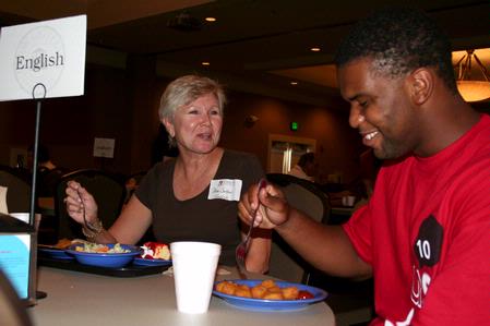 Pamela Sutton, professor of English, chats with incoming English students at the annual Dinner with Your Department event. - Photo by Deanna Santangelo