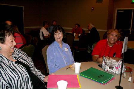 Joanne Stephenson, professor of psychology, and Teresa West, professor of psychology and department chair, enjoy the company of incoming freshmen during Dinner with your Department. - Photo by Deanna Santangelo