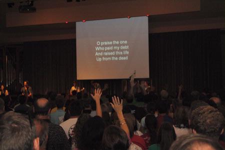 Students and parents sing praise in the evening worship service after Move In Day.   - Photo by Victoria Stargel