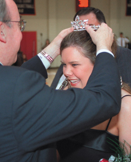 Senior Sarah Jane Head was crowned Homecoming Queen by President Dockery at halftime of the men's game during Homecoming 2002.  - Photo by Janelle Sou