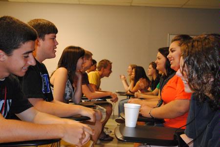 New students get to know each other through Focus Groups in a "speed dating" game. - Photo by Victoria Stargel