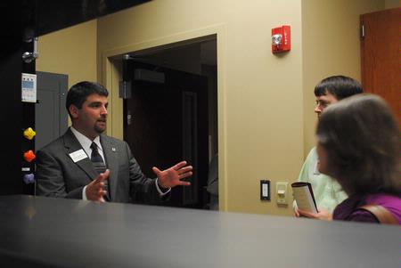 Blake Watkins, chair of pharmaceutical sciences, gives a tour of the one-of-a-kind pharmacy lab he designed in Providence Hall. - Photo by Victoria Stargel