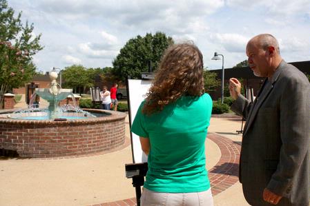 Chris Nadaskay, professor of art, gives instruction during his drawing class, which met outside on a beautiful day.  - Photo by Ebbie Davis