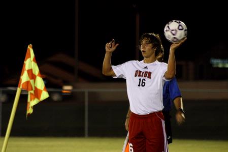 Cody Styx looks for an open man to throw to in the game against Delta State. The Bulldogs won 3-0.
 - Photo by Ebbie Davis
