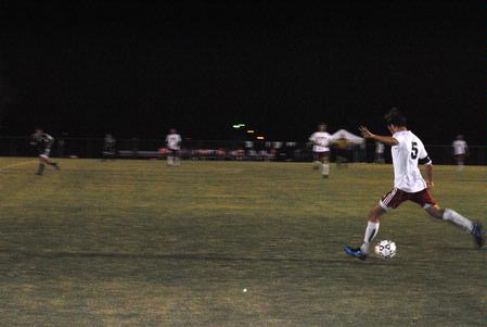 Jordan Thompson shoots toward the goal in a game against Truett-McConnell College, which ended in a 2-0 victory for the Bulldogs.  - Photo by Victoria Stargel