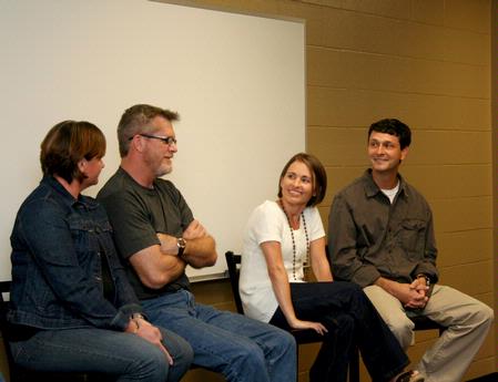 Paul and Janet Jackson answer a question asked by one of the students at Go Week: Reaching the Nations through Adoption. Mark Campbell and his wife Molly listen. - Photo by Deanna Santangelo