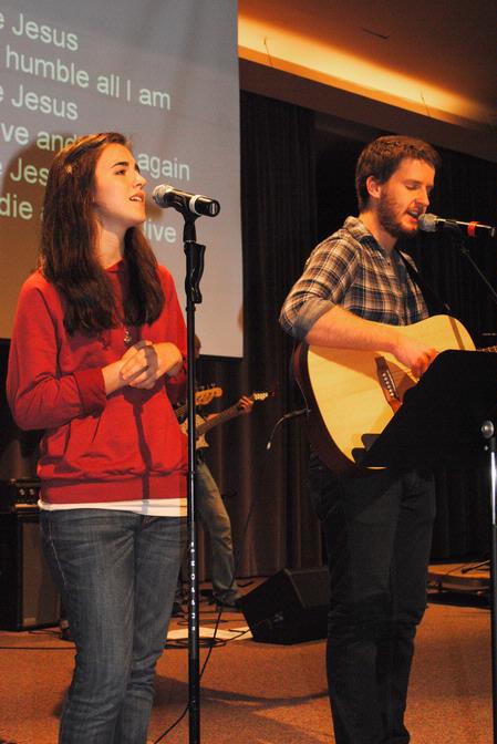 Natalie Wittman, junior english major, and TJ Hester, junior philosophy major, lead music during GO Week chapel. - Photo by Victoria Stargel