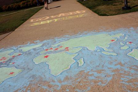During the annual Global Outreach Week the sidewalk heading toward the SUB was decorated with a map of the world. Stars indicate where this year's GO Trip destinations are.  - Photo by Ebbie Davis