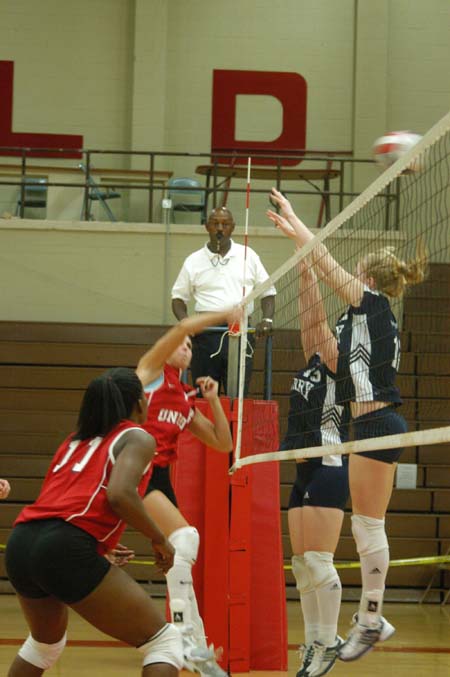 Senion Lady Bulldog, Jennie Glassey adds to her kills total with this smash in a 3-0 win over Berry College. - Photo by Steven Aldridge