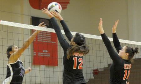 Marcela Madeira (12) and Shelby Swink. - Photo by Morris Abernathy